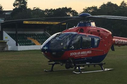 Football match delayed by air ambulance landing on pitch