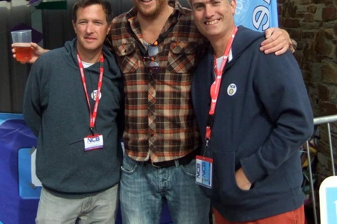 Station Director Dan Sproull (left) and former presenter Ben Holtam (right) with Kernow King (centre) at Looe Music Festival 2012.
