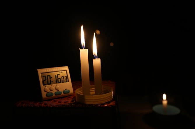Power outage candle stock image