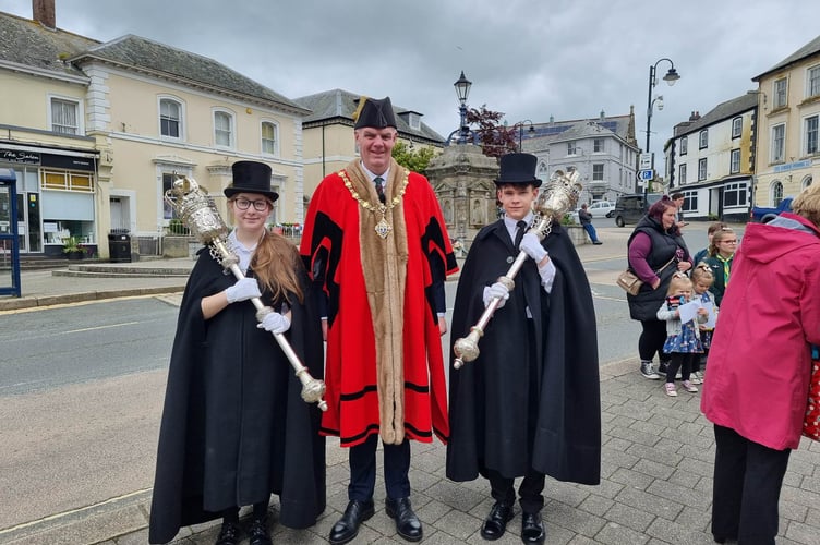 LISKEARD mayor Cllr Simon Cassidy attended the town’s Drumhead service for the coronation at the weekend. With him are young mace bearers Ethan Mort and Rose Ramwell, who is the first female to take on the role in  Liskeard