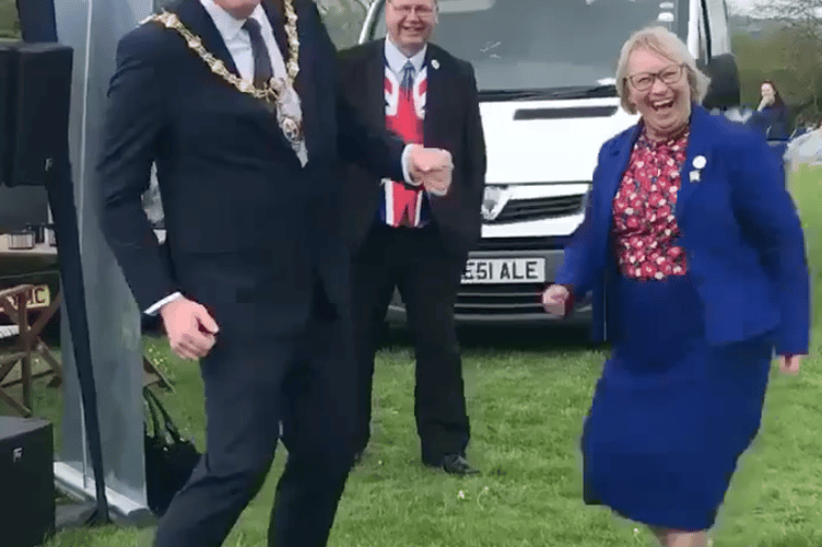 MAYOR of Liskeard Cllr Simon Cassidy joins in dancing with MP Sheryll Murray at Liskeard’s ‘Coronation Picnic in the Park’