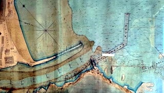 The original Joseph Thomas design of the Breakwater Pier. The Breakwater Pier terminates at White Rock and protects the river with a dog-leg design. 