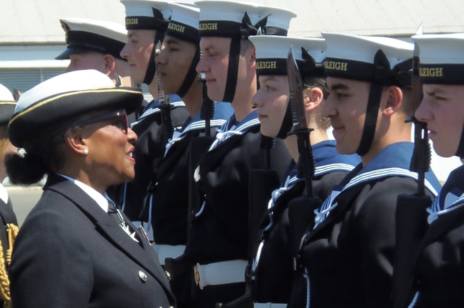 HON Capt Golding congratulates Passing-Out sailors at HMS Raleigh