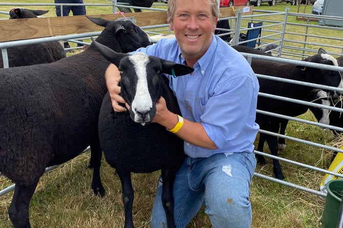 Matt Dodds from Liskeard with Kitty the Zwartbles yearling ewe. Kitty was awarded the local champion award. This was Matt’s 9th Liskeard show. “She did very well, I am pleased” he explained.