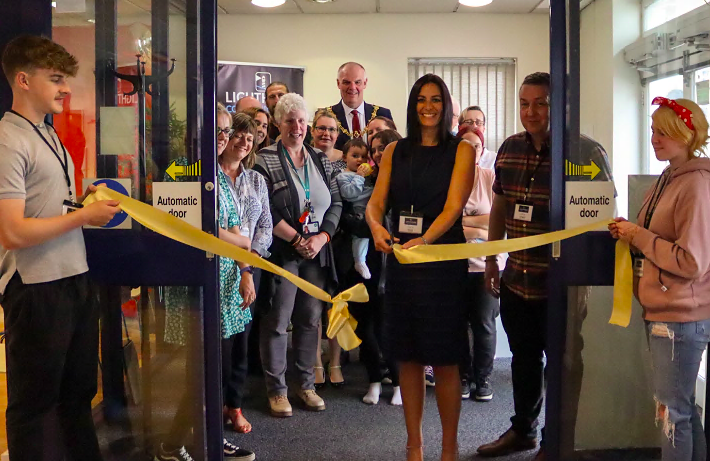 CLARE Bevan cuts the ribbon on the new Lighthouse Community Centre watched by staff, volunteers and supporters