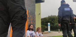 Just Stop Oil protestors cover Falmouth University in orange paint