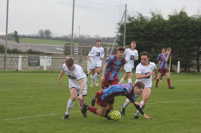 Launceston winger Dan Clifton goes down against Bodmin Town on Saturday.