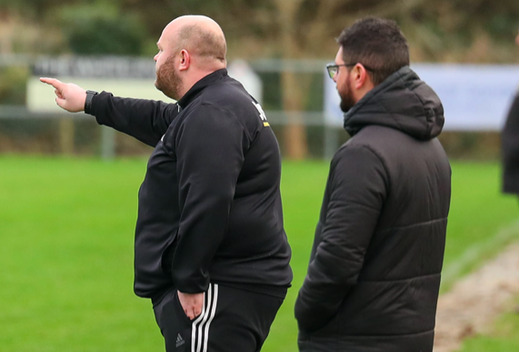 Brad Gargett (left) in his usual role at Sticker recently. Picture: Colin Hilton