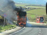 Double-decker bus fire causes A30 havoc