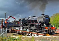 Impressive steam locomotive uses restored turntable near Par Station