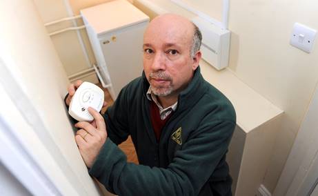Malcolm Farrow of OFTEC with a CO detector