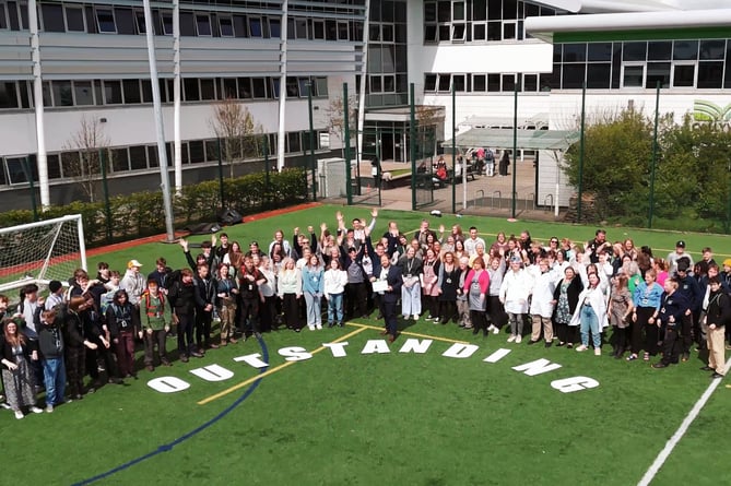 Students and staff celebrate the outstanding OFSTED award