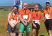 Looe runners tackle ten kilometre race in blazing sun 