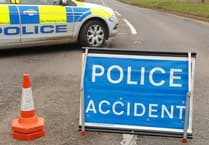 Road closed after two-vehicle collision