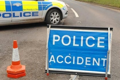 Road closed after two-vehicle collision