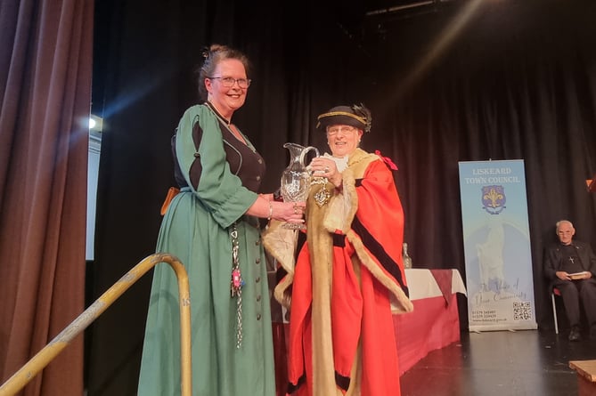 Sioux Dunster is presented with the George Vaughan-Ellis trophy to recognise her efforts at the historic Stuart House. (Picture: Terry Whitty)