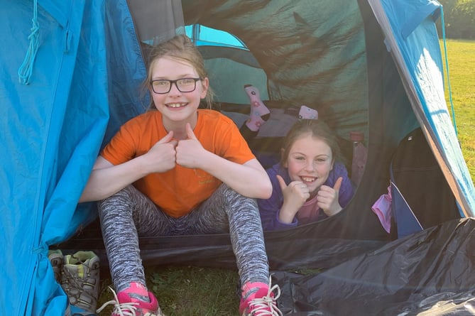 Lorelei and Alicia set up camp