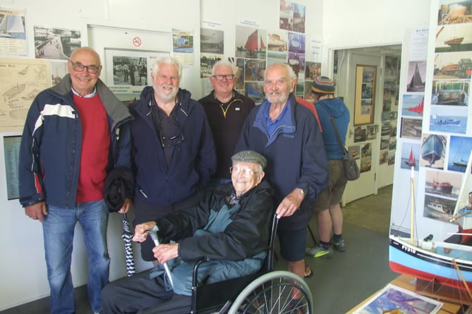 Looe’s oldest surviving boatbuilder, 99-year-old Jim Currah, enjoyed the pictorial display of the port’s boatbuilding heritage when he was joined by Brian Porter (fellow builder), Made-in-Looe regatta chairman Jeff Penhaligon, gallery host Ashley Bussell and Mike Darlington (fellow builder). (Picture: John Collings)