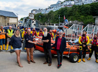 RNLI volunteers receive a generous donation from Rotary Club