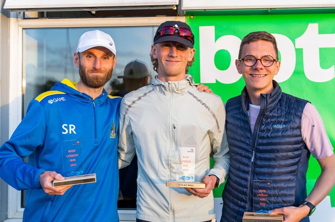 Bude's Joshua Benford (centre) won the race ahead of Truro's Steve Reynolds and fellow Bideford AAC runner James Pugsley (right).