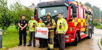 Firefighter raises more than £1,300 with challenging charity walk