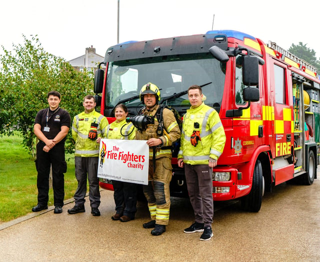 Firefighter raises more than £1,300 with challenging charity walk