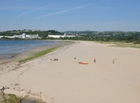 Shocking incident as two microlights land on busy beach