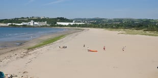 Shocking incident as two microlights land on busy beach