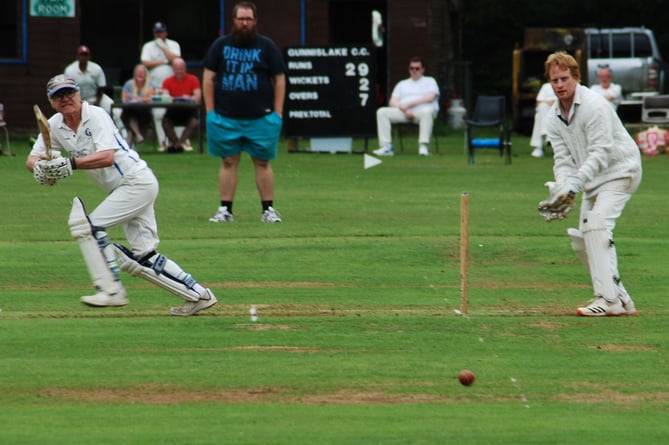 Gunnislake opener Stephen Lees plays a cut shot on his way to 30 against visiting Bugle on Saturday as wicket-keeper Paul Gribble watches on. Picture: Brian Martin/Gunnislake CC