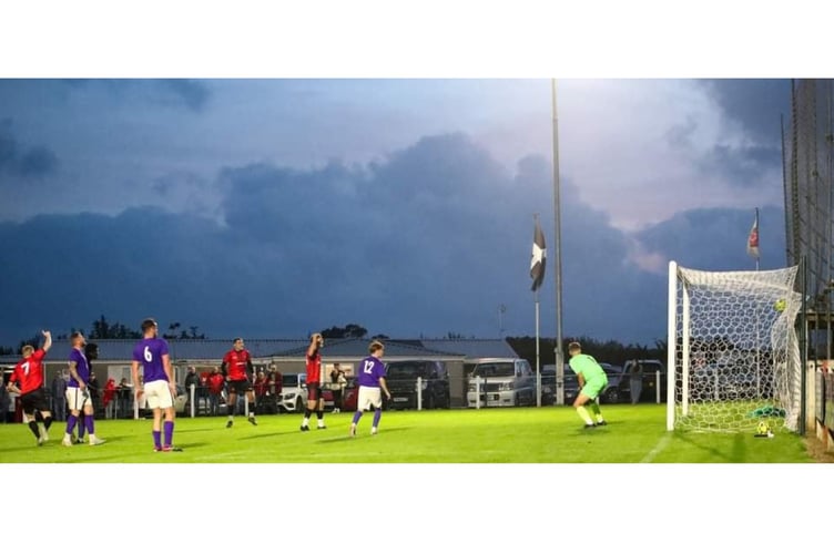 Sub Kai Burrell (7) runs off celebrating after planting an unstoppable volley past Millbrook's impressing goalkeeper Tom Burstow who was on debut. Picture: Colin Hilton