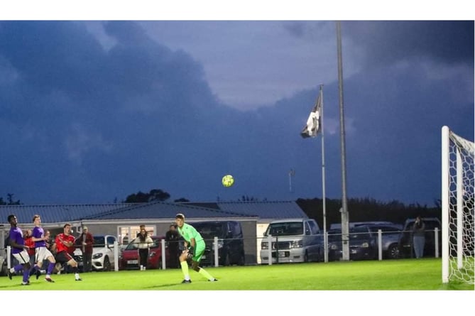 CJ Pritchard watches on as his 67th minute goal put the Dingos 2-0 to the good. Picture: Colin Hilton