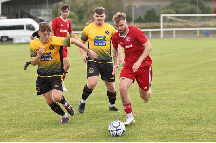 Torpoint Athletic's Josh Pope gets back to do his defensive duties at Barnstaple Town on Saturday. Picture: Steve Screech