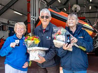 Two Looe fundraising volunteers recognised for RNLI long service 