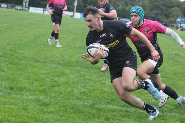 Launceston winger Ollie Bebbington, pictured scoring against Chew Valley earlier in the season, is back and named on the left wing. Picture: Paul Hamlyn