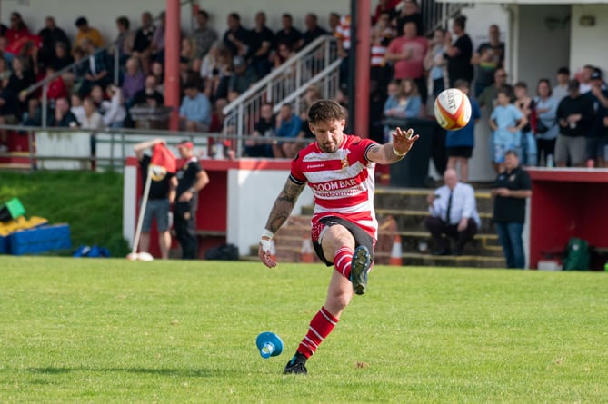 St Austell player/coach Matt Shepherd slots over a conversion at a sunny Tregorrick Park. Picture: Dave Phillips