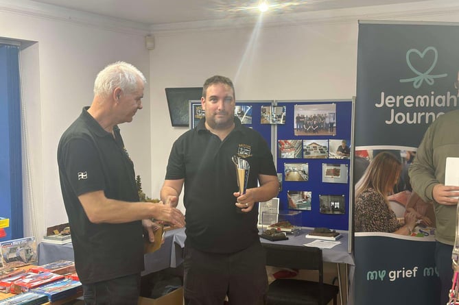 The overall competition winner this year for gaining the most points over the Saltash Model Club’s season was Ben Crouchen his trophy was presented by the club’s chairman David Parsons. (Picture: Saltash Model Club)