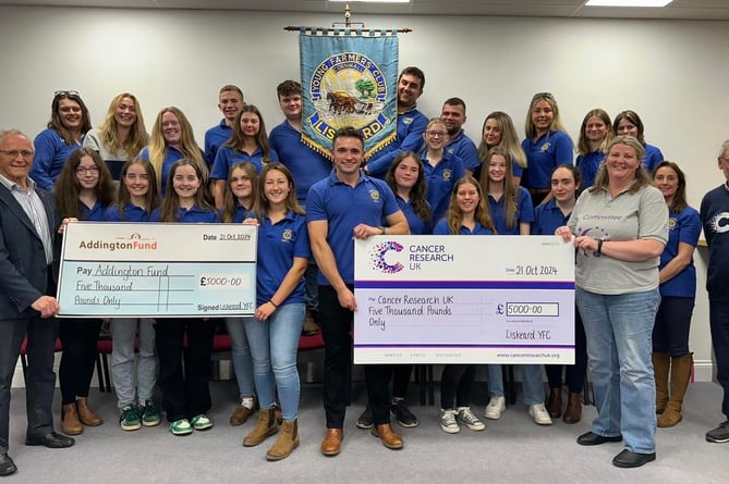 Liskeard Young Farmers handed over cheques of £5000 each in October to their two chosen charities Cancer Research UK and farming charity Addington Fund. (Picture: Liskeard YFC) 