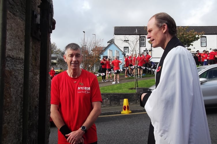 A running club from Plymouth ran the four miles to Saltash to partake in the two-minute silence with the congregation from St Nicholas and St Faith Church. (Picture: Audrey Miller)