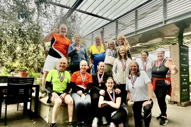 Looe running group 'Lisa Loonies' pose for a picture after completing the Eden Project 5K Park Run