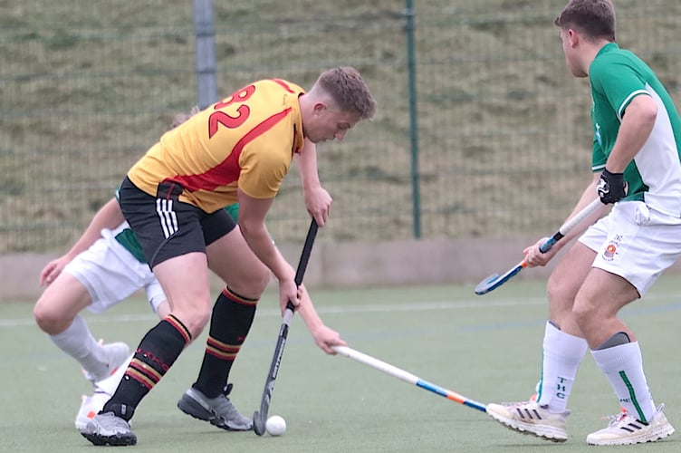 Caradon's Tyler Walsh, pictured tryin to get past two defenders enjoyed a fruitful afternoon at Lux Park. Picture: Glen Rogers