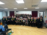 Rock choir's pitch perfect Christmas donations to Foodbank