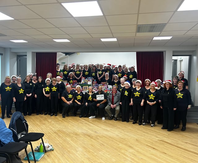 Rock choir's pitch perfect Christmas donations to Foodbank