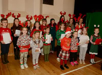 Kingsand and Cawsand celebrate annual light switch on despite storm