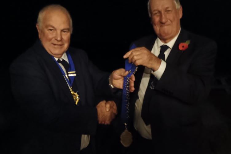 Liskeard Agricultural Show chairman, Colin Dymond (left) hands over the president's chain to Jerry Masters at their recent AGM