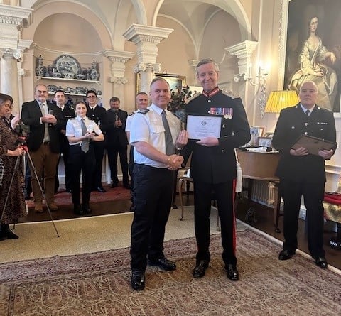 Liskeard Tri-Services Safety Officer, Kevin Goodreid, is presented with a special certificate of achievement by the Lord Lieutenant of Cornwall, Colonel Edward Bolitho