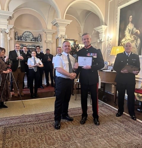 Liskeard Tri-Services Safety Officer, Kevin Goodreid, is presented with a special certificate of achievement by the Lord Lieutenant of Cornwall, Colonel Edward Bolitho