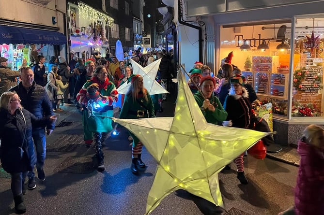 Santa's elves, Looe Pioneers sang Christmas carols to the residents of Rivermead Residential Home before joining the lantern parade. (Picture: Jonathan Boakes)