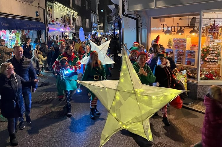 Santa's elves, Looe Pioneers sang Christmas carols to the residents of Rivermead Residential Home before joining the lantern parade. (Picture: Jonathan Boakes)