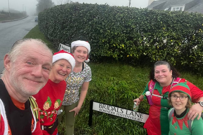 Looe Pioneer runners were in festive form for the annual Christmas Eve run around the town which ended up at the Old Boathouse for mince pies and port. (Picture: Guy Cooper)