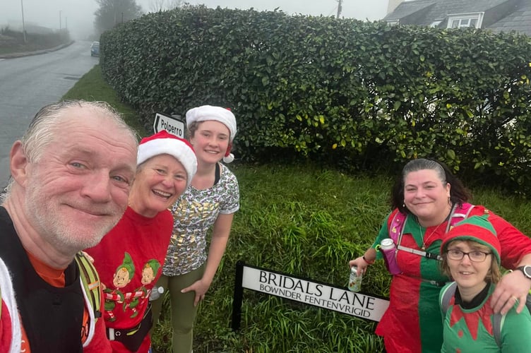 Looe Pioneer runners were in festive form for the annual Christmas Eve run around the town which ended up at the Old Boathouse for mince pies and port. (Picture: Guy Cooper)